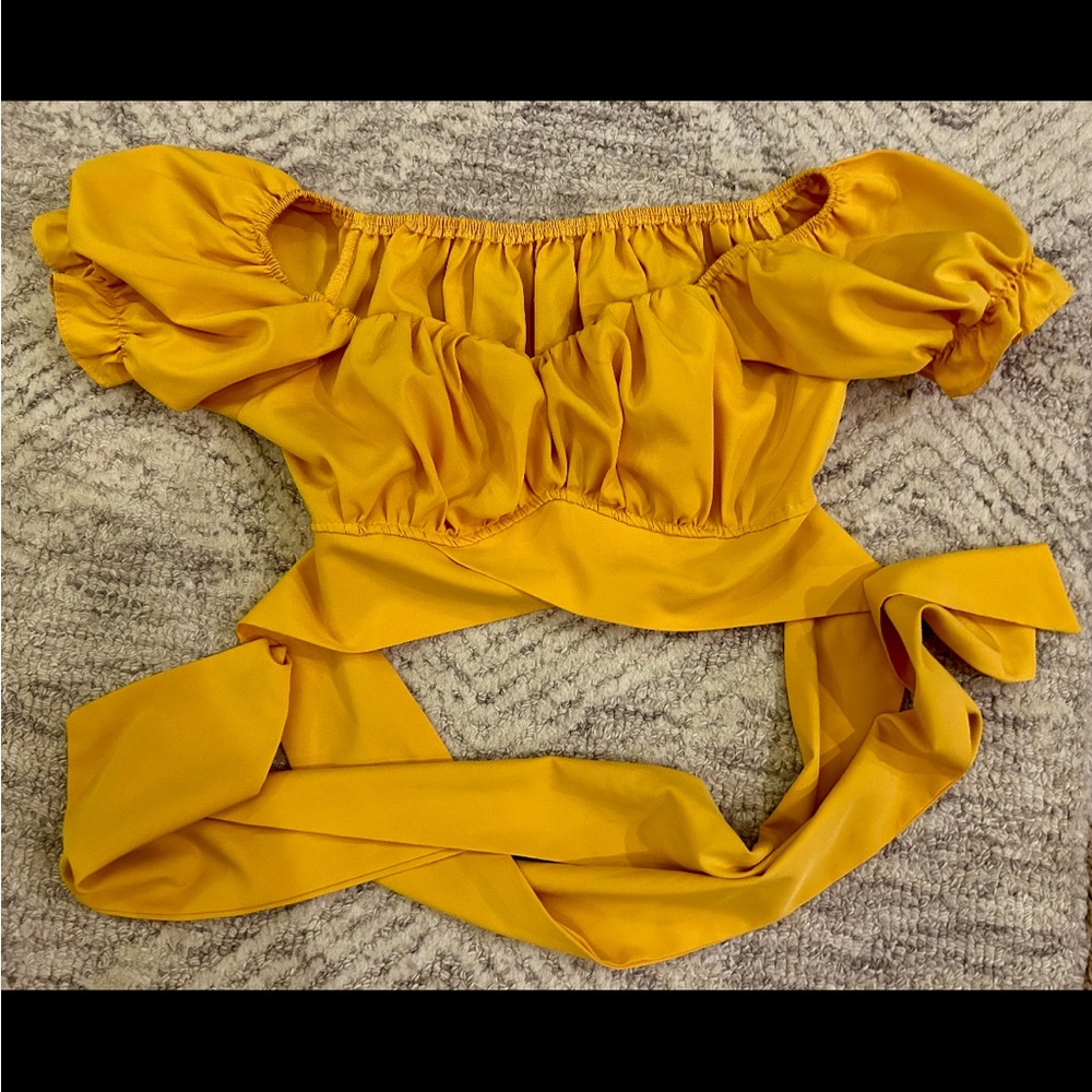 Yellow crop top that wraps around the front and ties in back